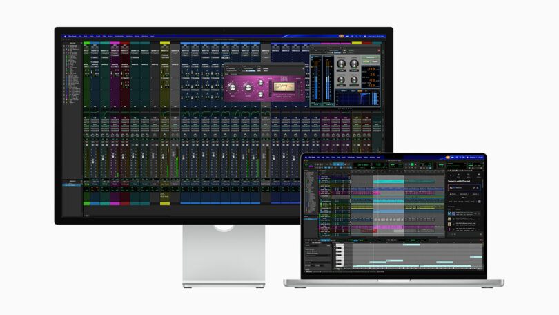 A computer monitor and a laptop displaying digital audio workstation software with multiple tracks, audio plugins, and mixing controls visible on both screens.