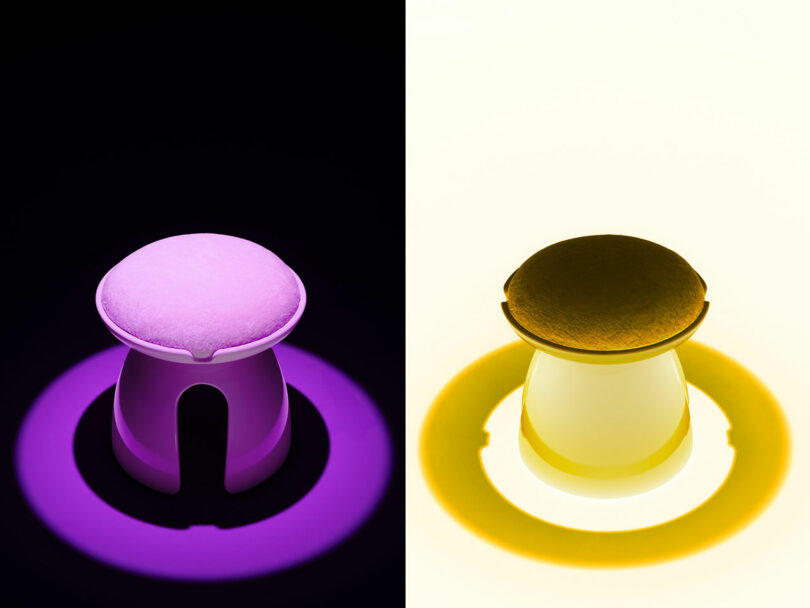 A modern Holly Hunt stool is shown under two different lights: purple on the left side, yellow on the right, creating colored shadows and contrasts on a dark background.