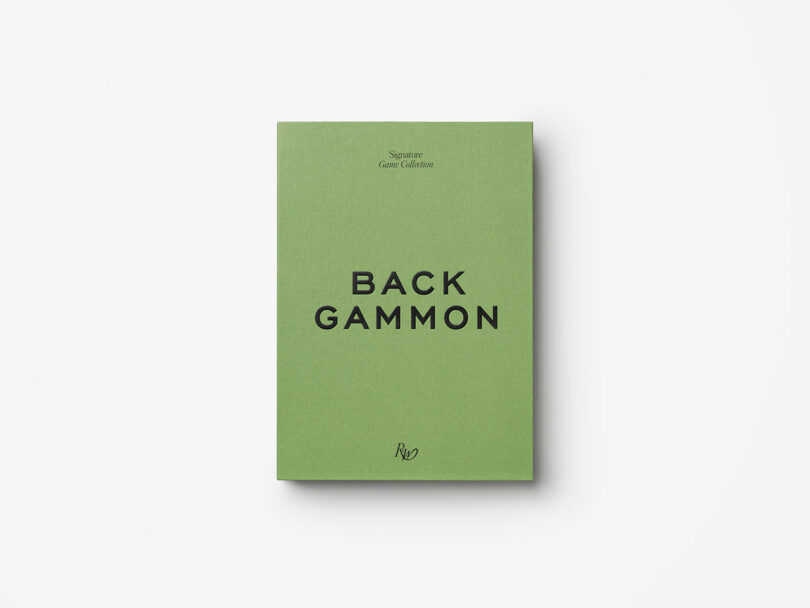 A green rectangular box with the word "BACKGAMMON" printed in bold black letters on the front.
