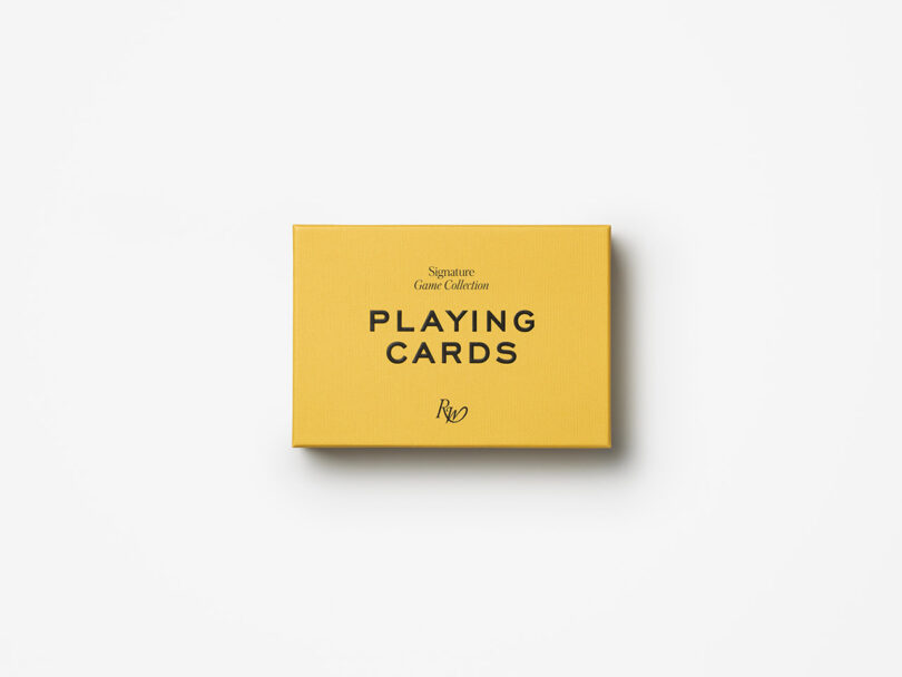 A yellow box labeled "Signature Game Collection PLAYING CARDS" is centered on a white background.