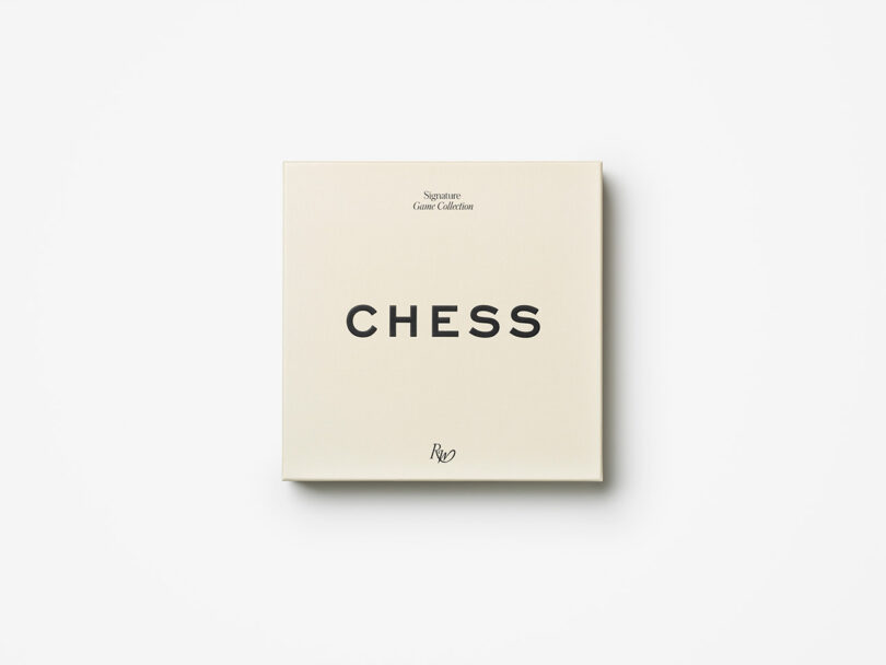A square cream-colored box with the word "CHESS" printed in large black letters on the lid, centered on a plain white background.